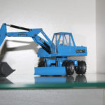 Fuchs 713 M mit Humusschaufel