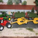 Case mit Scrapern für den Erdbau