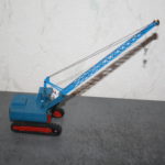 703 mit selbst gebautem Kranausleger auf Fahrwerk des 713