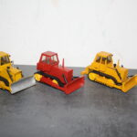 ...rechts als Hanomag mit Aufreiser